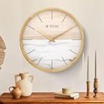 Titan Contemporary Wooden Analog Clock with Wood & Stone Textures On The Dial – W0077Wa01 Rs. 1648 – Amazon